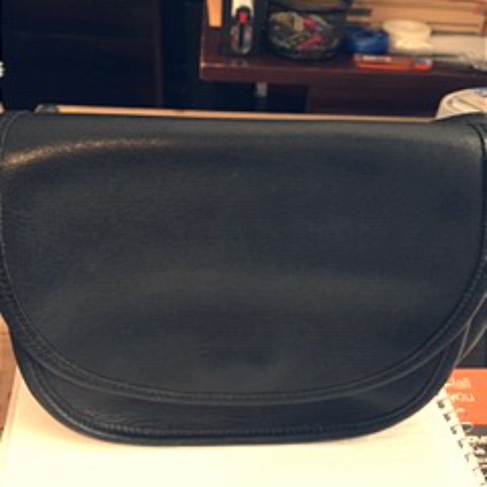 Black vintage small Coach saddlebag